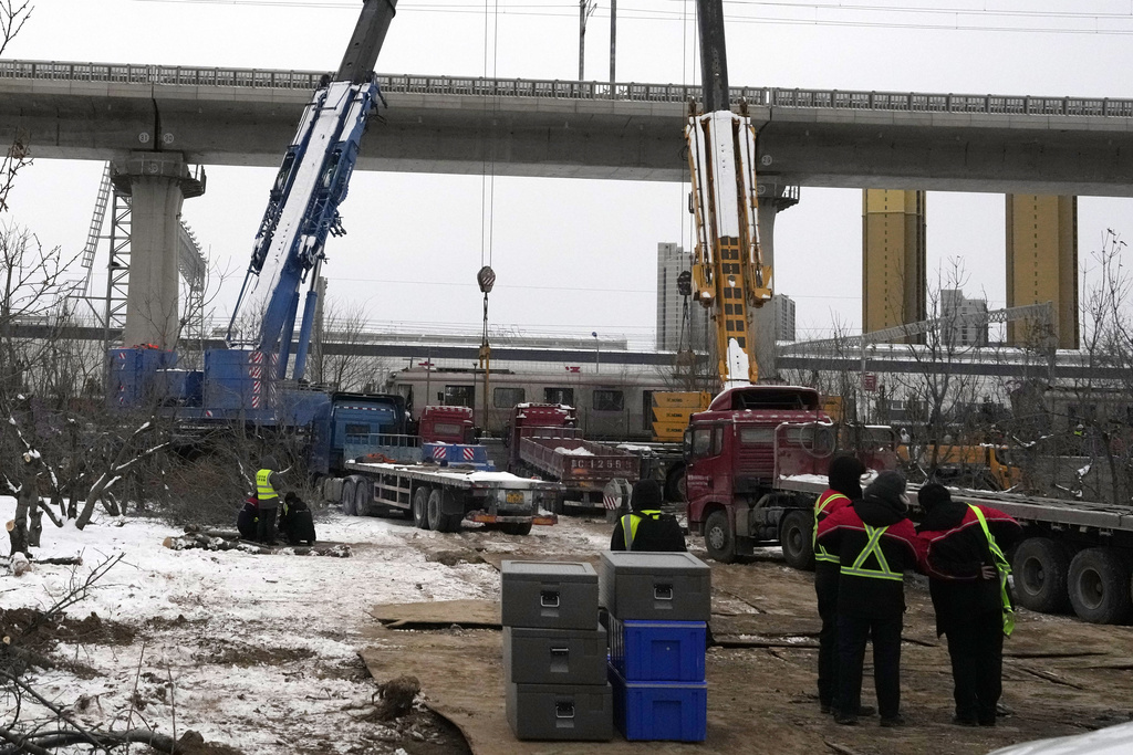 Choque entre dos trenes deja 515 heridos durante una intensa nevada en Beijing